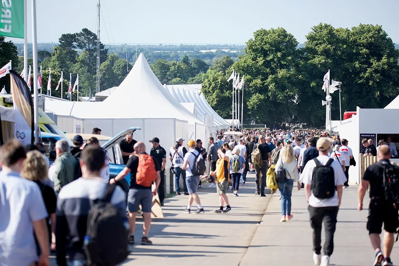 Visitors walking through the Goodwood Festival of Speed in July 2024